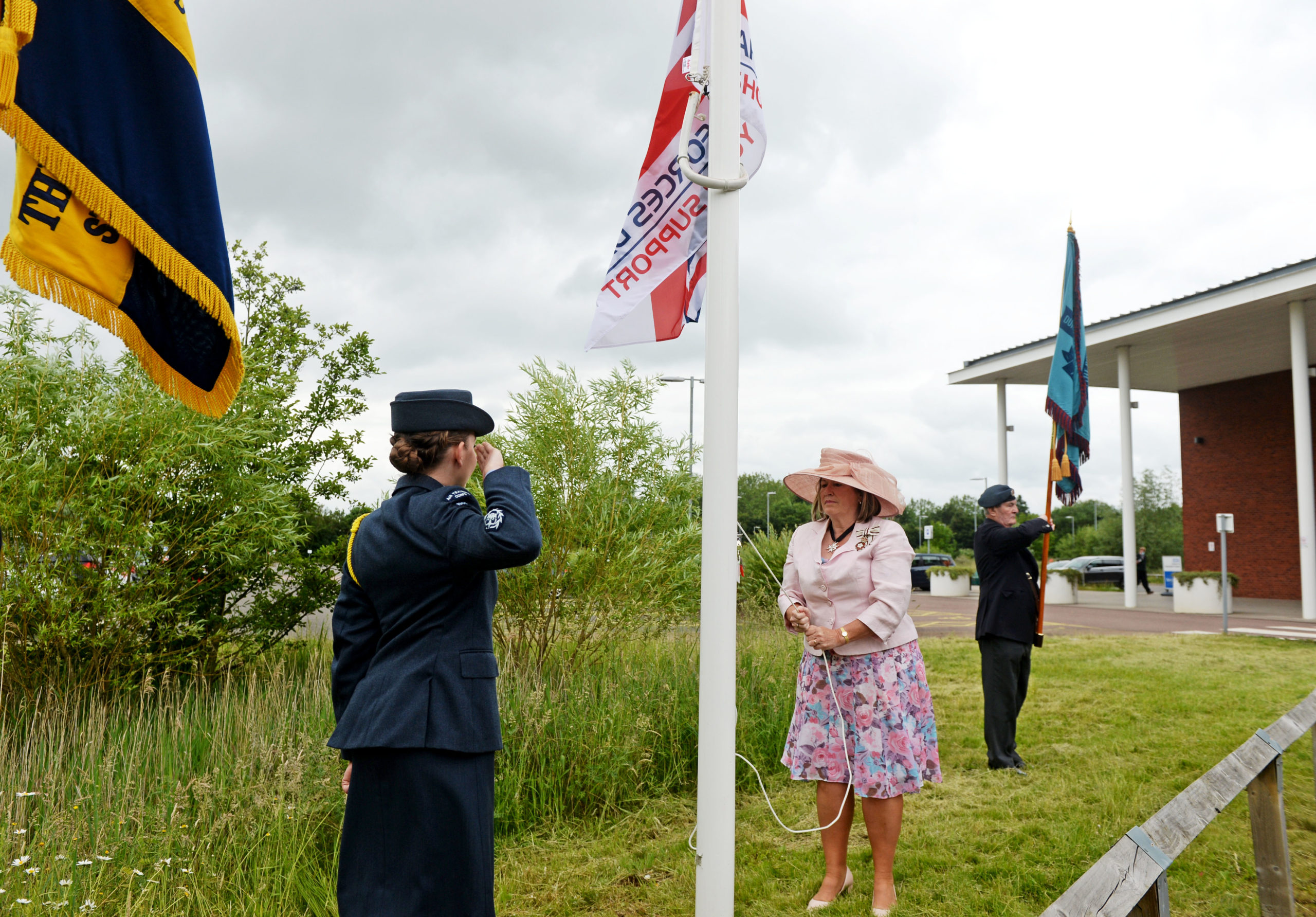 CWO Abby Bierton Raising Armed Forces Day flag