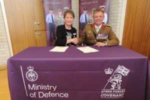 Denise and Col Jackson sign the Armed forces Covenant