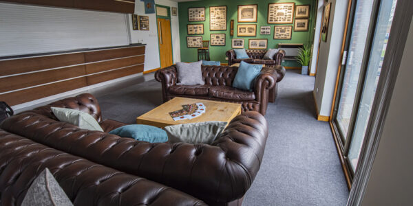 Chesterfield Sofas and new carpets and new lighting in empty officer's mess at Coldhams lane