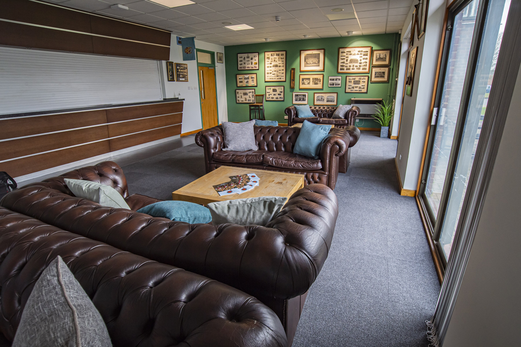 Chesterfield Sofas and new carpets and new lighting in empty officer's mess at Coldhams lane