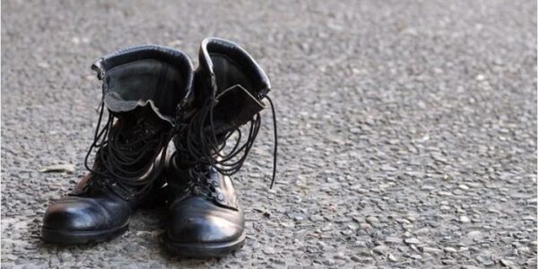 Military boots on bitumen to illustrate the Veterans' Gateway