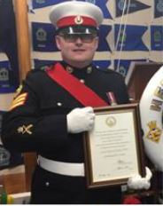 Andy Smith with his Meritorious Service Certificate
