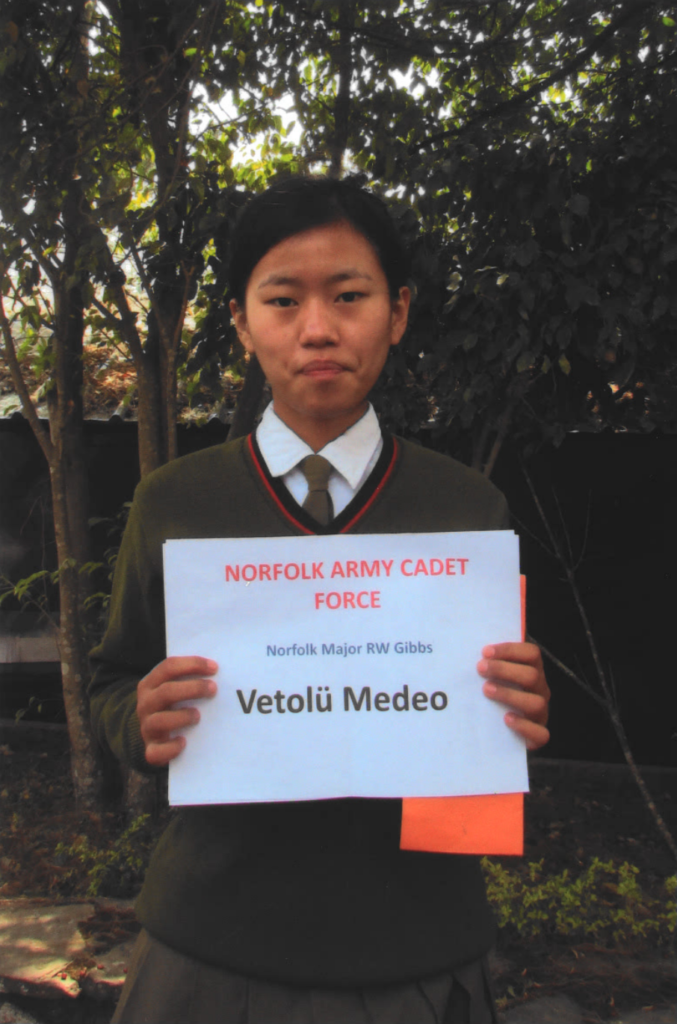Photo of 15 year old Vetolu Norfolk ACF scholarship recipient holding her certificate