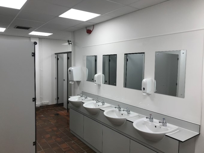 row of new sinks and new lighting in changing rooms at Colchester Army Reserve Centre