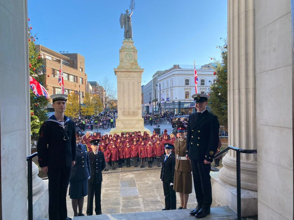 Bedfordshire Lord lieutenant's Cadets stand to attention on the steps in front of the memorial in Luton