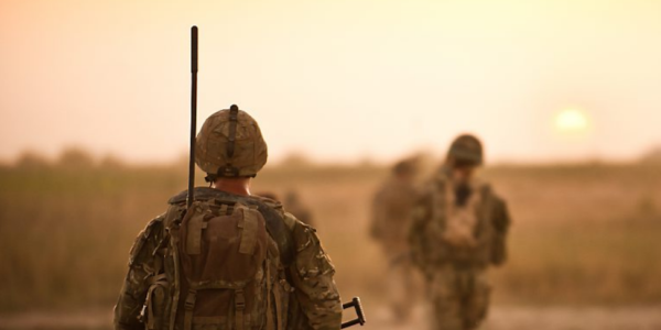 communications soldiers walking in arid plains to illustrate strength of the reserve forces
