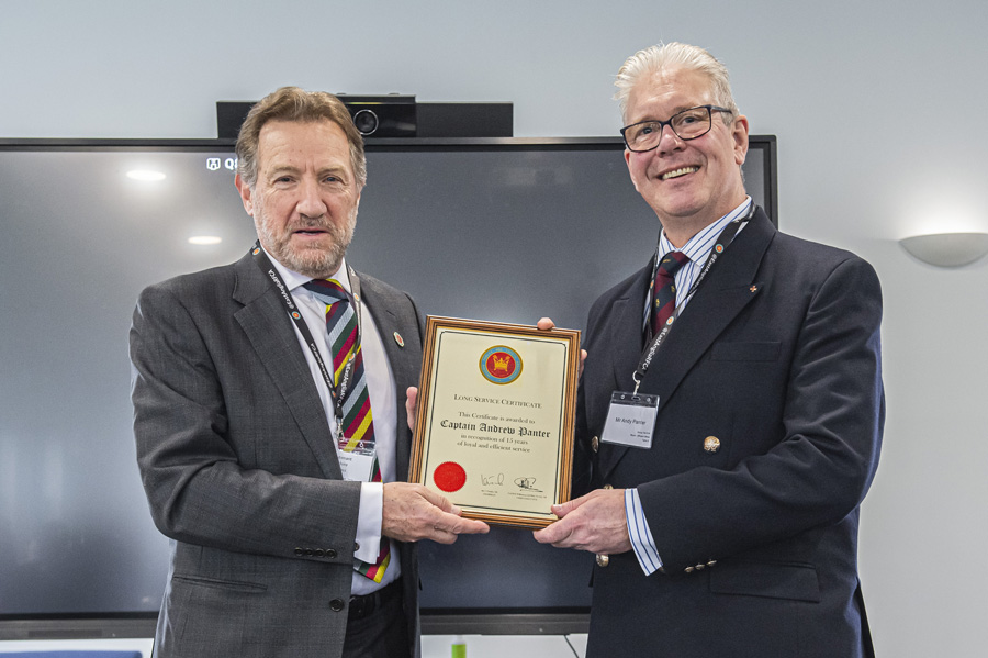 Andy Panter holds his certificate for 15 years at East Anglia RFCA with the President of the Association, HM Lord-Lieutenant Mr Robert Voss