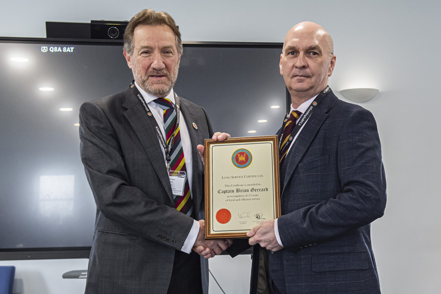 Captain Brian Gerrard holds his certificate for 15 years at East Anglia RFCA with the President of the Association, HM Lord-Lieutenant Mr Robert Voss