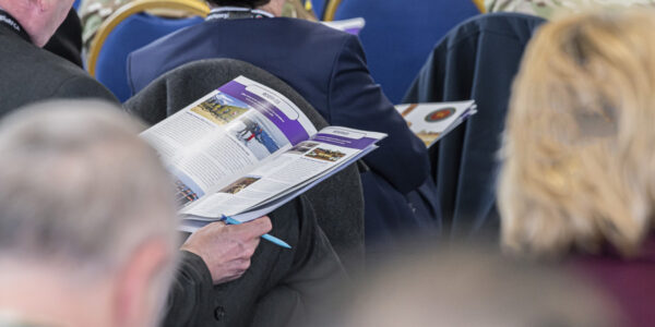 RFCA member looks through the Annual Report at AGM