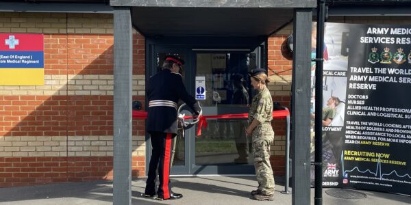 HM Lord Lieutenant Robert Voss cuts the ribbon at the Army Reserve Centre in Hitchin
