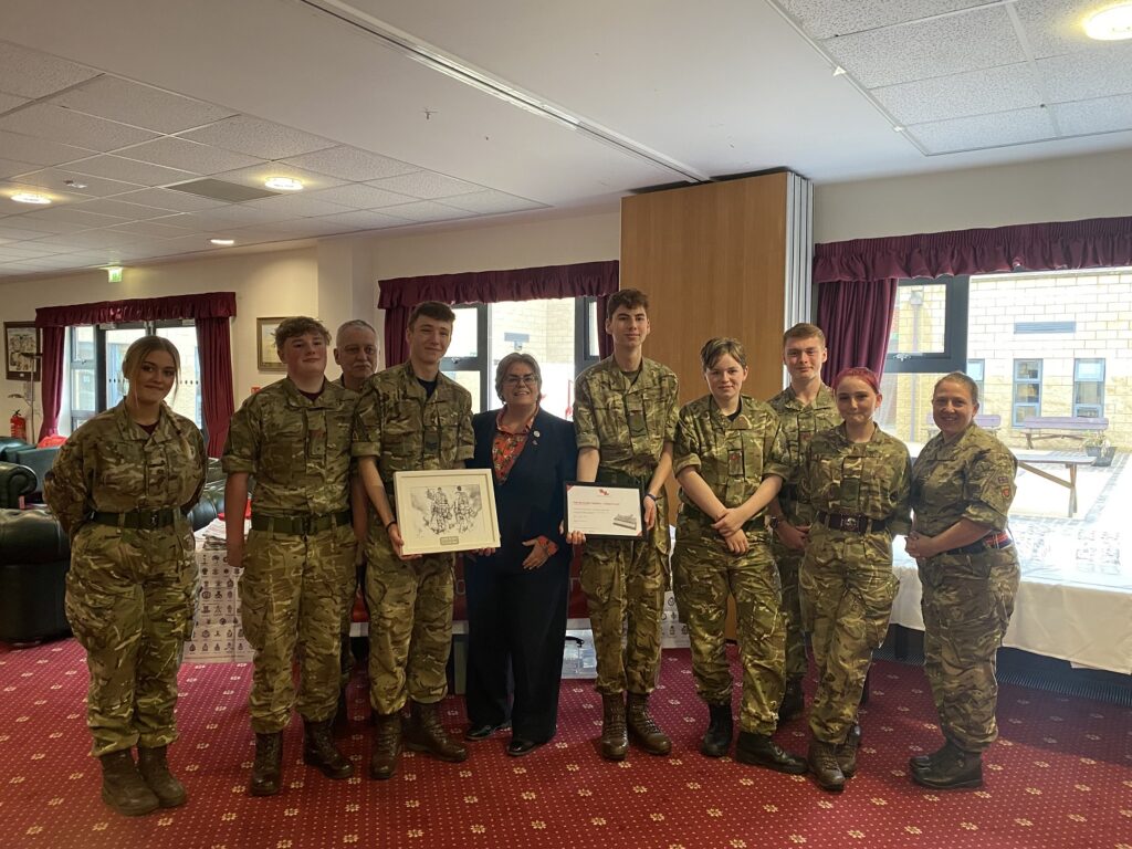 Col Barr-Jones with Colchester Army Cadets holding Cadet Revision competition certificates